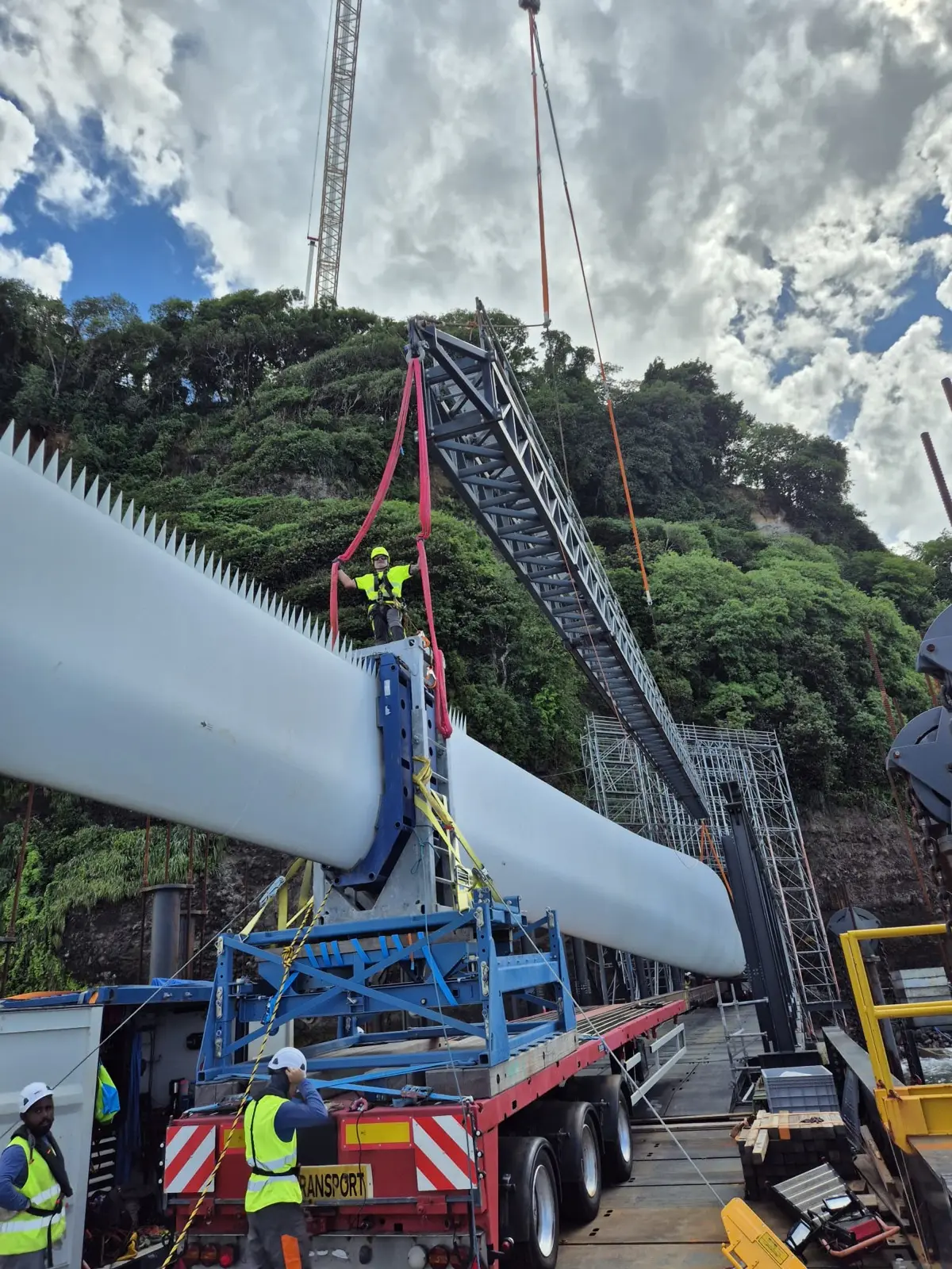 Lifting a turbine blade from a transport trailer